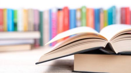 open-book-with-library-bookshelf-toned-background-picture-id1165510711-800x450